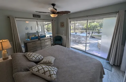 Waterfront Paradise w dock, large patio, lanai, pool, hot tub! Bring your boat!