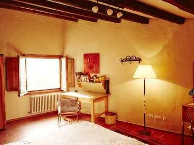 Typical Spanish Masia (country house) of natural stone with private garden and pool