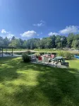 Cottage 1 is a charming 2 bedroom only 25’ from its boat dock & Hamlin lake. - 2-Star