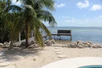 NEPTUNES END - 4 Bedrooms / 3 Bathrooms Waterfront Retreat-  Pool & Sunset Views