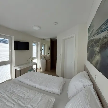 NEW! modern, high-quality, central apartment, with sauna, garden, wallbox in Burhave