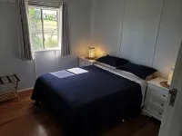 Indoor/outdoor pet-friendly beach house next to world-class beach and river. - Beach