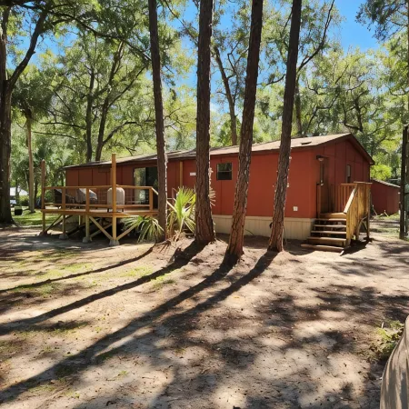 1-1/2 acre Park like wooded setting. Clean 3/2 with plenty of parking.