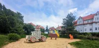 FeWo Urban Gotha - Apartment Orangerie - Am Schlosspark- Parken an der der Tür- Barrierefrei, 900 Meter zum Bahnhof - Wallbox - 3-Sterne