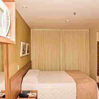 Mont Blanc Suites Duque de Caxias Rooms