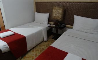 Ecoland Suites & Inn