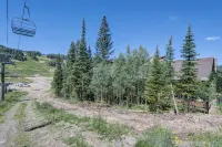 True ski-in/out two-level condo BH. Perfect for two families with a king suite.