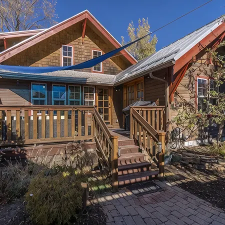 WALK EVERYWHERE!  4 BEDROOMS +BONUS RM & QUAINT BACKYARD