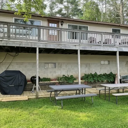 Waterfront property on pond with private dock .