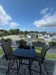 Stay Steps from the Water: Pool Access & Impeccably Styled Condo - Boutique