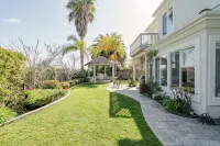 Luxe family home w/ 116 inch theatre, near beach w/ private yard & EV chargers - Luxury