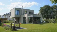 House on the Havelbogen directly on the water with canoe and jetty, terrace apartment - Apartments