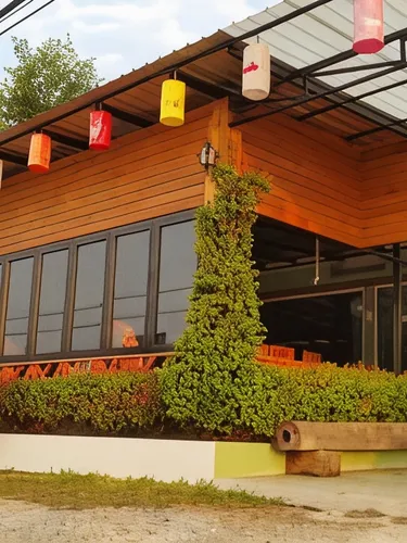 รูปภาพของเรือนนริศรา​ รีสอร์ท