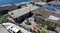 A Few Steps to the Beach! Ocean Views, Patio with Fire Pit and Garage Parking!