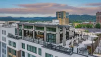Embassy Suites by Hilton Asheville Downtown Hotels near Guns & Roses Statue - located in Burton St. Peace Gardens