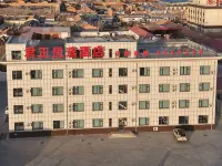 Junzheng Preferred Hotel โรงแรมในอูลาเต๋อฮัวจี