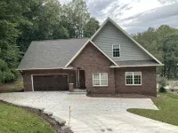 Lakefront Custom Home /w Private Dock on Cove.  Finished Basement.  2 Kitchens