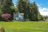 Open Design West Coast Home on 1600 Feet of Private Waterfront