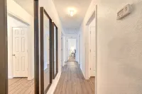 King bed with Pool table, decked patio and, gym.