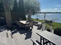 Experience Lake Life at Our 3-Bedroom Beachfront Cottage, Near Grand Rapids.