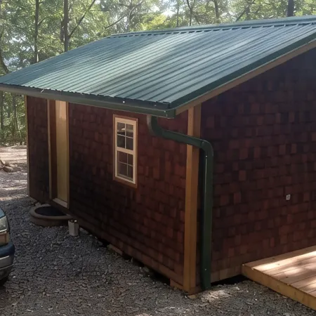 HICKORY HIDEOUTThe cabin is surrounded by a large area of trees for privacy