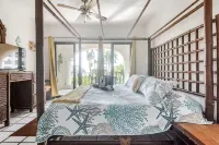 Beachfront 3b ground-level condo with stunning Caribbean Sea views in Playacar 1 - Homestays