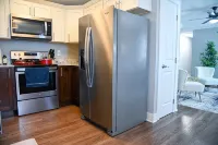 Cozy 2-Bedroom Apartment Minutes from Downtown - Condos