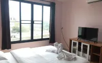 Sutharnlai Apartment Hotels in Si Prachan District