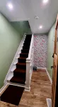 This is a private second-floor suite with its own entrance.