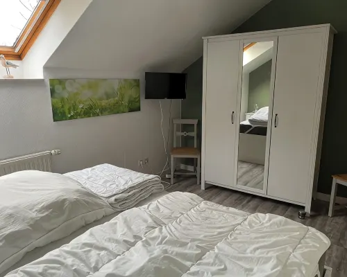 Cozy vacation apartment with dike view in Wremen Hotels in Wremen