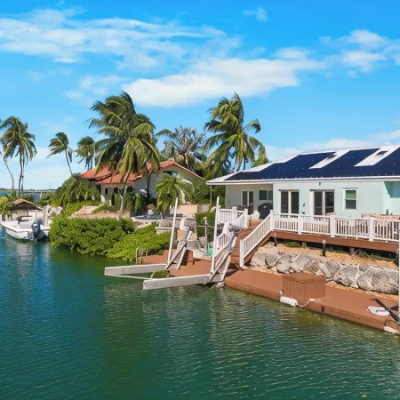 Waterfront Home with a Large Dock, Pool, and Deck Area. Can Accommodate Pets.