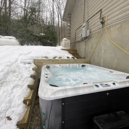 Lakefront cabin with dock, hot tub, fire pit!!