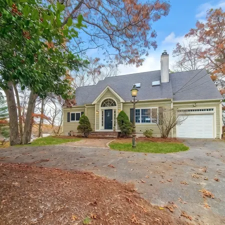 Lakefront Stunning Cape Cod Views w Private Lake Beach - Backyard is the Lake !