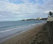 Stay as a tourist & feel as a local; Beach & Loiza st. strip, everything near!