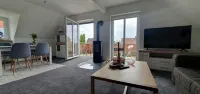 Ferienwohnung mit Kamin, Balkon, Boxspringbett, 3 Personen, See-und Waldnähe - Wifi