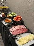 Apple Economy Hotel - petit déjeuner