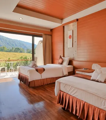 ห้องดีลักซ์ เตียงแฝด พร้อมระเบียง