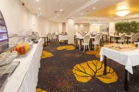 Hôtel Paradis - Desayuno