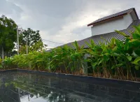 Muslim' Daniah Homestay Melaka Hotels in Belimbing