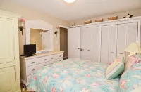 Steps away from the Ocean,  Gym, Gazebos, Indoor/Outdoor  Pools, & Tennis Courts