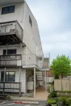 Lovely Renovated 2-Level Condo + Pool + Steps to the Beach!