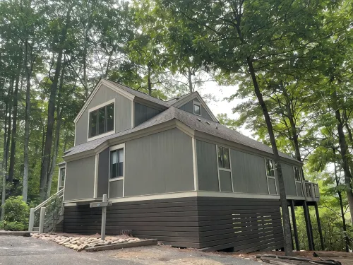Breathtaking lake views, steps from beach, golf, and clubhouse. Renovated home!