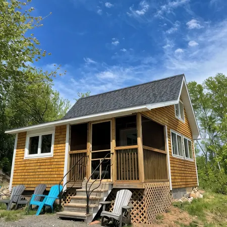Bright and charming cabin on the Cabot Trail overlooking St. Ann’s bay.