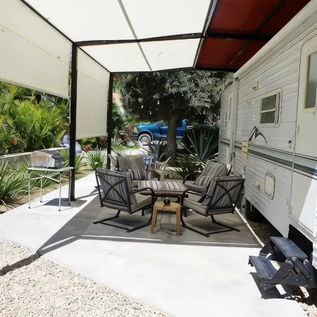 RV on private lot with pool 10 min walk to the beach