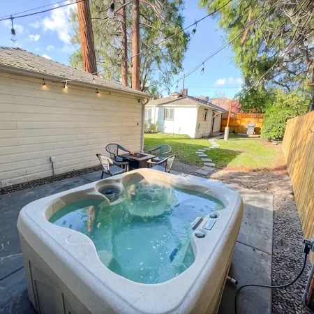 Cute Home with fully fenced yard Hot Tub and Fire Pit.