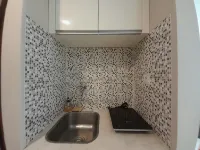 Modern Look and Homey Studio at Mataram City Apartment By Travelio - Condos