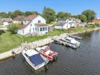 Waterfront Getaway with reserved Dock/Boat Slip on Ahnapee River Wifi Hotels in Algoma