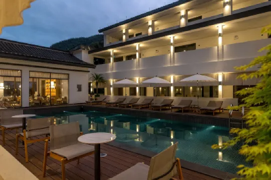 โรงแรมรีสอร์ทน้ำพุร้อนเชียนนากวานชาน โรงแรมใกล้ต้าถังโรงน้ําชา