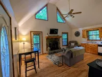 Cozy cabin with wrap around porch and only minutes to town!