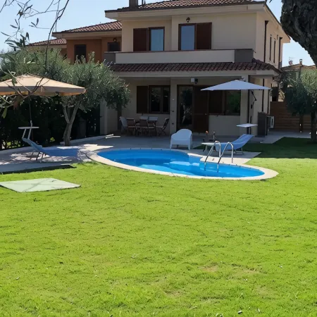 Villa with pool in a quite Village near the Beautiful Sandy beach of Costa Rei